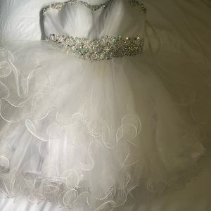 This is a white fluffy dress - used once at a quince (Mex - tradition party)